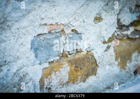 Conception de briques et mur en pierre - vue rapprochée dans les bâtiments historiques de Trieste Banque D'Images
