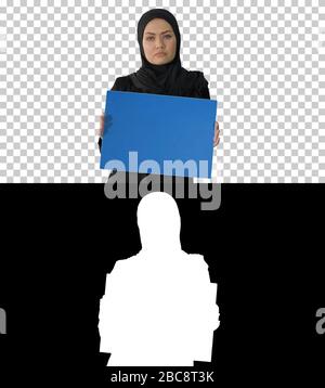 Femme musulmane proteste Dame vêtue de noir et tenue d'un vide Banque D'Images