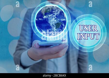 Écriture manuelle conceptuelle montrant la saisie utilisateur. Concept signifie toute information ou donnée envoyée à un ordinateur pour le traitement des éléments de cette image f Banque D'Images