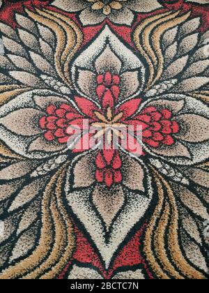 Ornements floraux abstraits sur le tapis soviétique rétro gros plan Banque D'Images