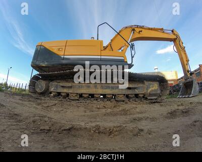 Pelle hydraulique industrielle pour travaux au sol sur un chantier de construction en extérieur Banque D'Images
