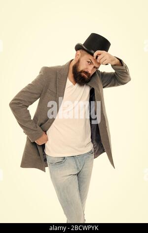 Sans compromettre le style. Mode homme en style rétro. Hipster branchée avec moustache et barbe en style casual wearing vintage hat. Bearded man in black hat dans un style classique. Banque D'Images