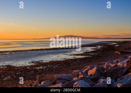 Coucher de soleil sur le Solway Firth vers Crilockel Dumfriesshire Scotalnd Banque D'Images