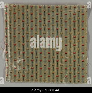 Fragment. Recherche sur le fragment de velours ProgressGray avec un motif de rayures blanches alternant avec des rayures de points et des tirets noirs. Les points sont alternativement noir, orange et blanc cassé ou noir, brun clair et blanc cassé. Fragment Banque D'Images