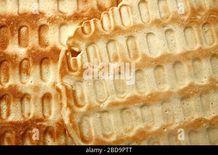 La texture de surface des gaufres, des gâteaux faits maison.gaufres arrière-plan. Banque D'Images