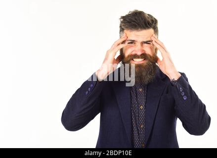 Un homme d'affaires frustré avec la barbe a mal de tête - isolé sur blanc Banque D'Images