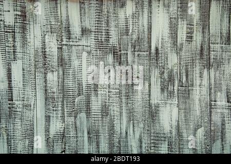 Texture du bois. L'arrière-plan est noir et blanc avec un soupçon de turquoise. Banque D'Images