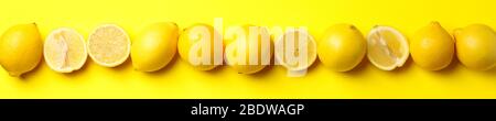 Citrons frais sur fond jaune, espace pour le texte Banque D'Images
