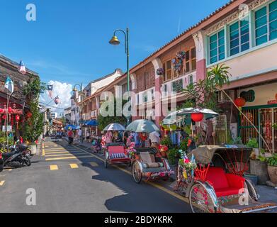 Pousse-pousse à vélo sur Lebuh Armenian (rue arménienne), ancien quartier colonial, George Town, Penang, Malaisie Banque D'Images