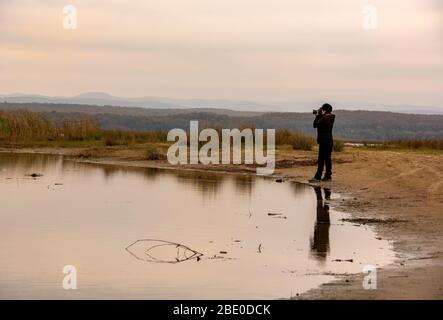 11/18/2018,Igneada,Kirklareli,Turquie,photographe essayant de prendre des photos par la mer Banque D'Images