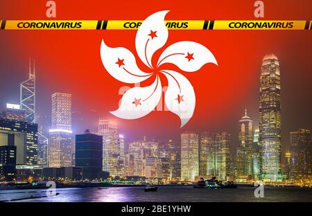 Horizon de Hong Kong la nuit avec menace de coronavirus. Banque D'Images