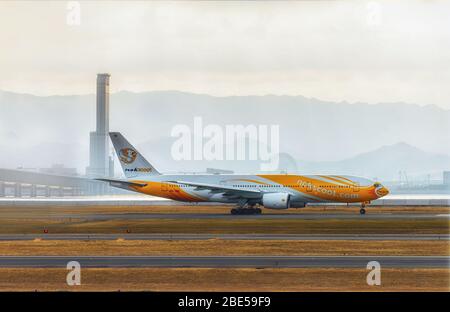 NOK avion de scoot en attente de décollage à l'aéroport international Kansai, Japon Banque D'Images