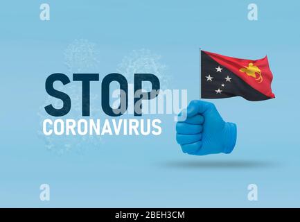 COVID-19 concept visuel - texte à la main Stop Coronavirus, geste à la main contre infection virale, poing serré est drapeau de la Papouasie-Nouvelle-Guinée. Pandémie tridimensionnelle Banque D'Images