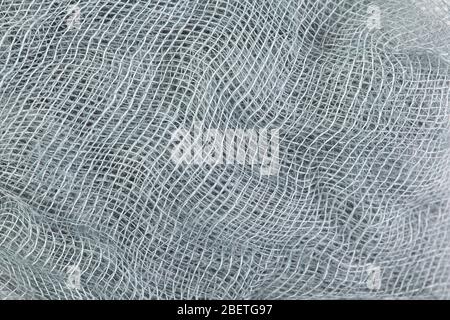 Gros plan d'une texture de fond de gaze abstraite. Vue de dessus. Banque D'Images