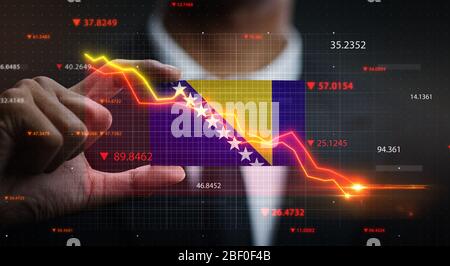 Graphique descendant devant le drapeau de Bosnie-Herzégovine. Concept de crise Banque D'Images