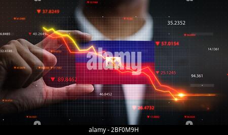Graphique descendant devant le drapeau d'Haïti. Concept de crise Banque D'Images