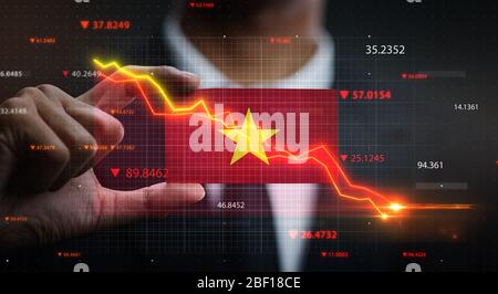Graphique descendant devant le drapeau du Vietnam. Concept de crise Banque D'Images