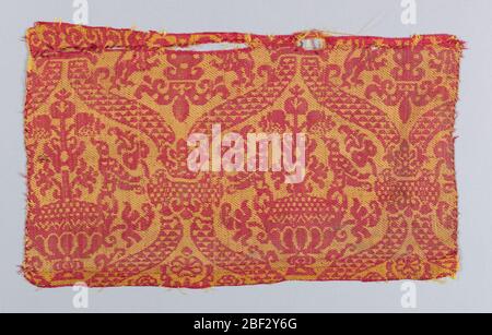 Fragment. Schéma des vases avec pots-de-vin de chaque côté dans un cadre de damier. En rouge et jaune. Banque D'Images