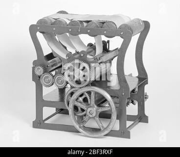 Modèle de brevet d'une machine d'impression de plaques Intaglio. Ce modèle de brevet démontre une invention pour une presse d'imprimerie intaglio, qui a reçu le brevet numéro 210116. Le brevet décrit un mécanisme d'essuyage de plaque qui reproduit le mouvement de balayage de la main humaine. Banque D'Images