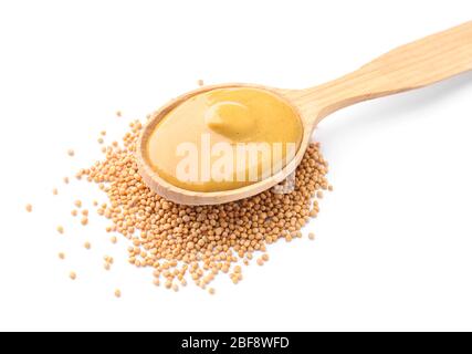 Cuillère avec sauce moutarde au miel sur fond blanc Banque D'Images