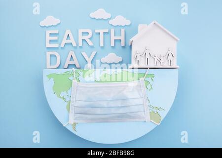 La journée de la terre dans un style moderne. Quarantaine. Concept de planète Terre sauvée. Banque D'Images