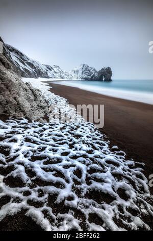 Neige à Durdle Door - Dorset UK Banque D'Images