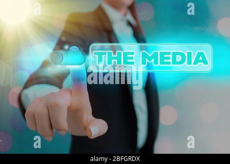 Main conceptuel écrit, indiquant les médias. Sens Concept principal moyen de communication de masse qui sont considérées collectivement Banque D'Images