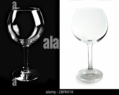 Deux verres à vin vides, isolés sur fond noir et blanc Banque D'Images