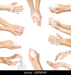 Collage avec de jeunes belles mains de lavage, isolé sur blanc Banque D'Images