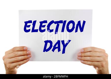 Carte de main avec texte jour de l'élection isolé sur blanc Banque D'Images