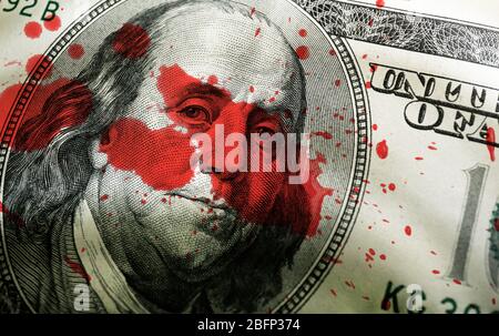 Face dollar et éclaboussures de sang de gros plan Banque D'Images