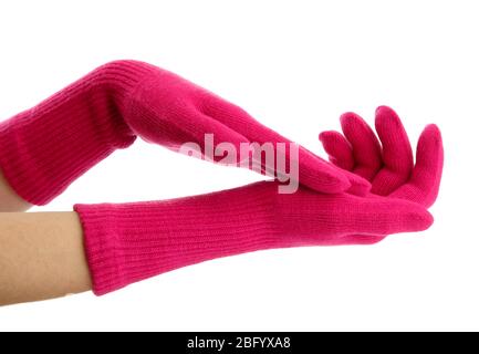 femme tricoté des gants sur les mains, isolée sur blanc Banque D'Images