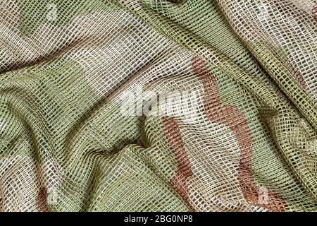 Gros plan sur un foulard militaire en mesh tactique. Banque D'Images