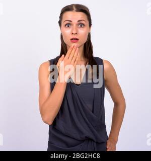 Portrait de la jeune belle femme qui a l'air choqué Banque D'Images