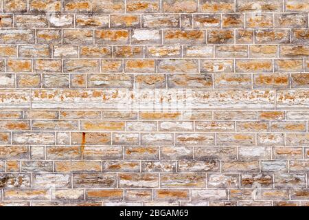 Beau bâtiment en calcaire brun datant du XIXe siècle conservé texture de mur avec joints de mortier de pointage de tuckpoting Banque D'Images