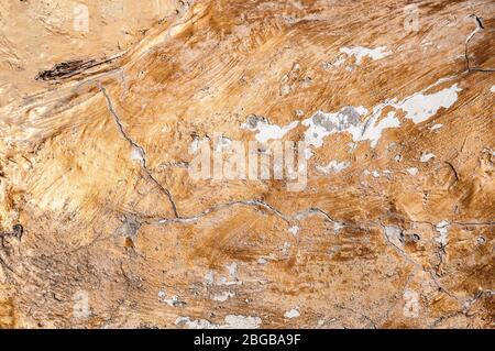 Textures fond de peinture dorée peinte en béton endommagé. Banque D'Images