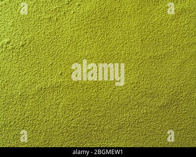 Fond de thé vert matcha en poudre. Gros plan. Thé en poudre macha vert sec avec espace de copie pour le texte ou le dessin Banque D'Images