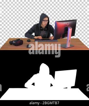 Hacker tapant rapidement à l'ordinateur, Alpha Channel Banque D'Images