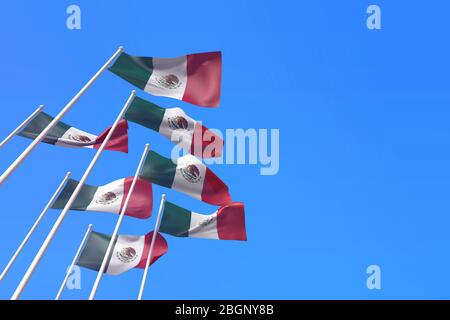 Le Mexique marque des drapeaux qui agitant dans le vent contre un ciel bleu. Rendu 3D Banque D'Images