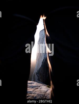 Vue du nez sur El Capitan entre les jambes au coucher du soleil depuis le sommet Banque D'Images