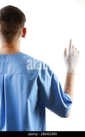 Main de médecin dans des gants stériles montrant le signe, isolé sur fond blanc Banque D'Images