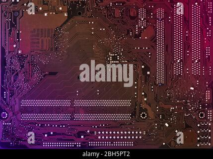 Arrière-plan de la carte mère de l'ordinateur avec éclat multicolore fluo flou, fond de pc, gros plan Banque D'Images