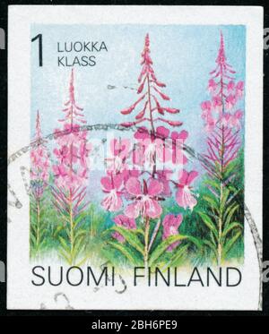 POLTAVA, UKRAINE - 24 avril 2020. Cachet vintage imprimé en Finlande vers 1992 montrer la fleur Banque D'Images