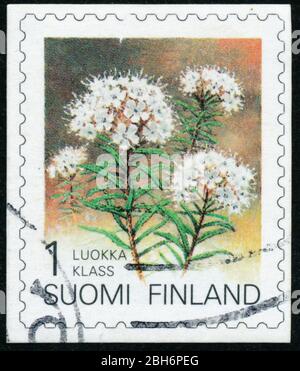 POLTAVA, UKRAINE - 24 avril 2020. Le timbre vintage imprimé en Finlande vers 1993 montre la fleur Banque D'Images