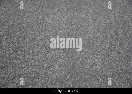 Texture de gravier de ciment gris. Arrière-plan abstrait, texture gravier ou fond gravier. Gravier de granit de macadam, gris roche écrasé pour la construction Banque D'Images