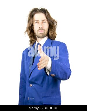 Un homme aux cheveux longs en soirées Banque D'Images