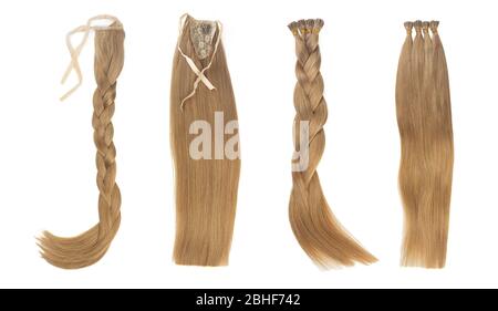 Ensemble de multiples fausses extensions de cheveux de femmes dans la queue, isolé sur fond blanc. Couleur blonde foncé ou marron. Et différents types d'accessoires. Banque D'Images