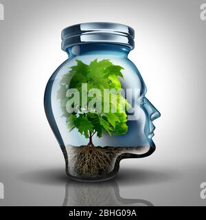 Concept de psychologie de la croissance intérieure et idée de développement personnel comme un pot en verre façonné comme une tête humaine avec un arbre à l'intérieur représentant la santé mentale. Banque D'Images