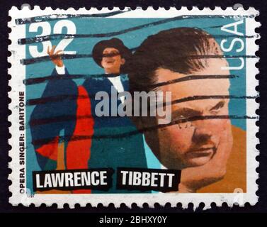 USA - VERS 1997: Un cachet imprimé aux Etats-Unis montre Lawrence Tibbett, chanteur d'Opéra américain, vers 1997 Banque D'Images