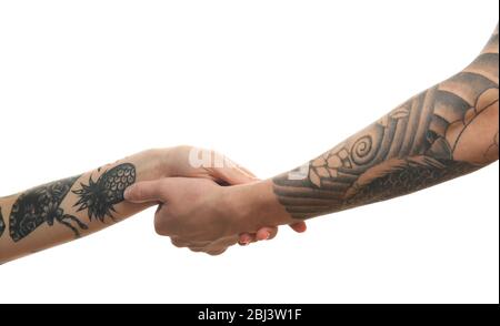 Les mains de la femme et de l'homme avec un tatouage isolé sur blanc Banque D'Images